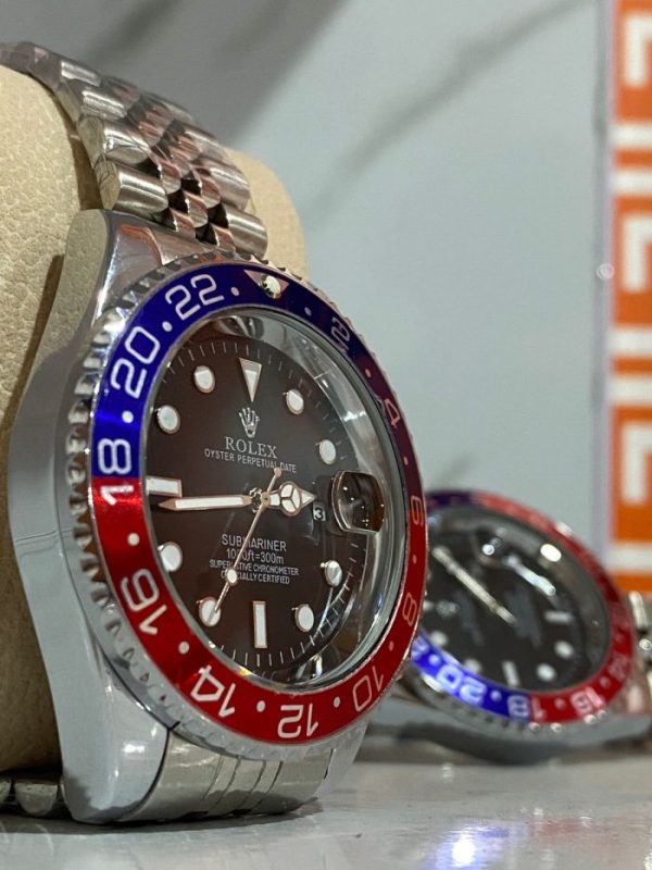 ROLEX GMT-MASTER II PEPSI BLUE AND RED BEZEL STAINLESS STEEL JUBILEE WATCH